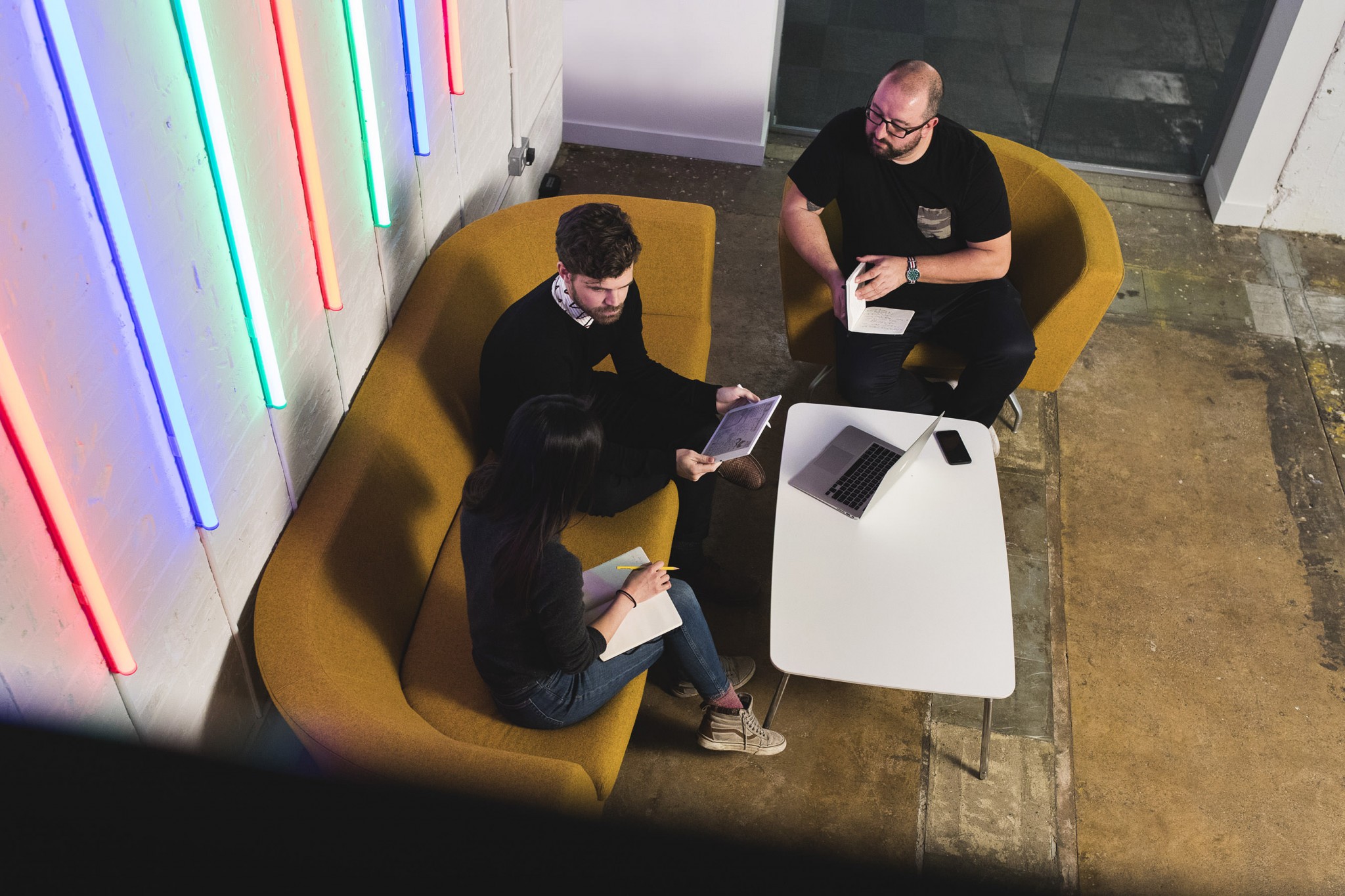 overhead view of meeting in trendy office