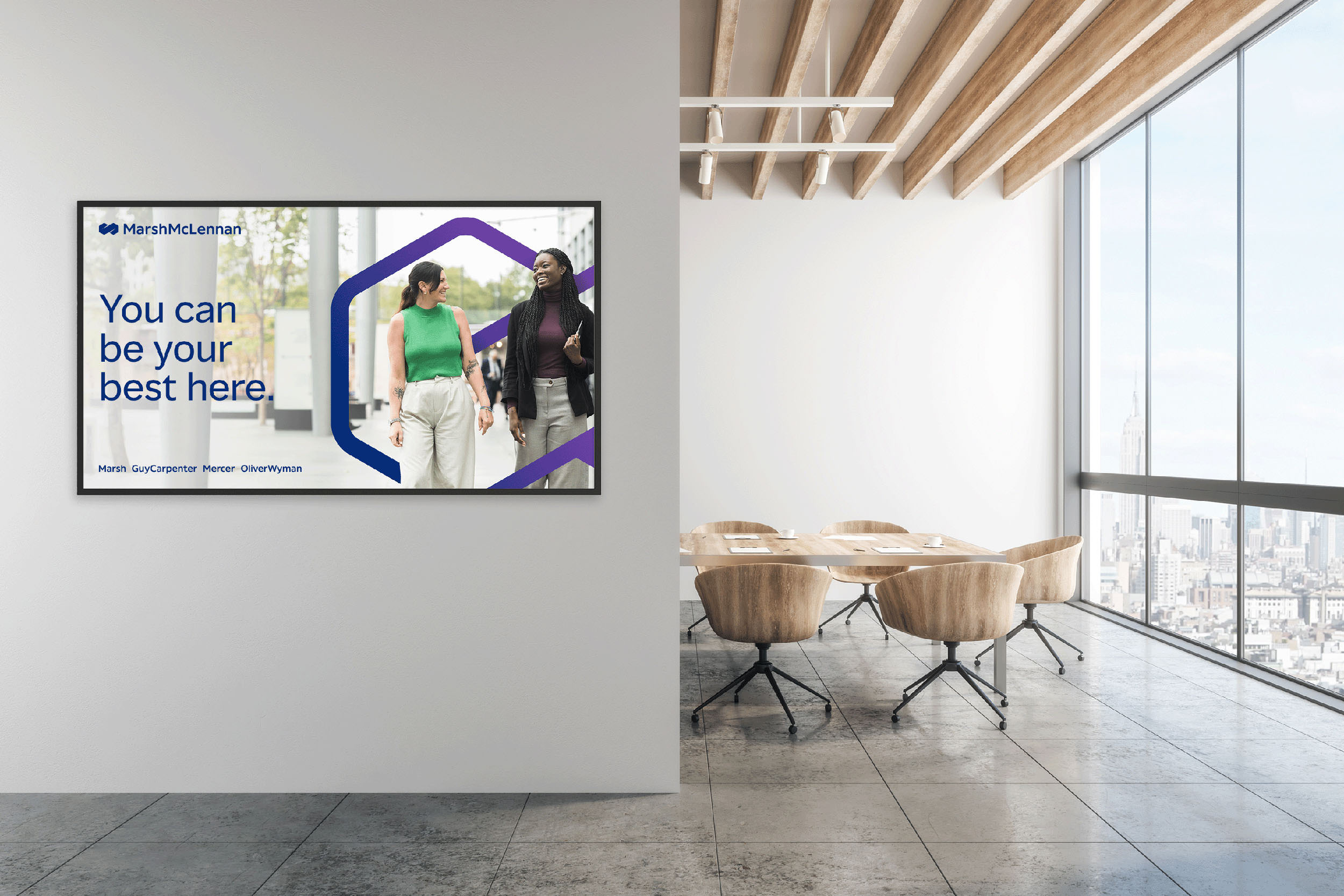 company portrait of females talking outdoors displayed on office wall in new york